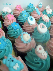 24 mini unisex baby shower cupcakes